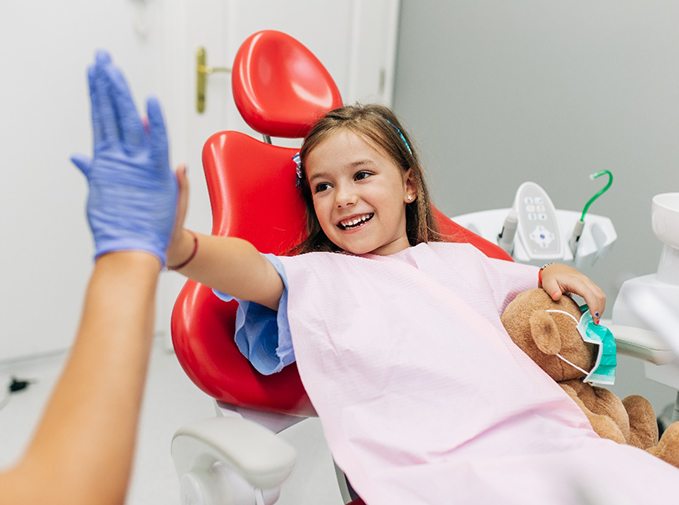 A cute little girl who got dental crowns in Inver Grove Heights