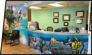 Ocean themed reception desk in pediatric dental office in Inver Grove Heights