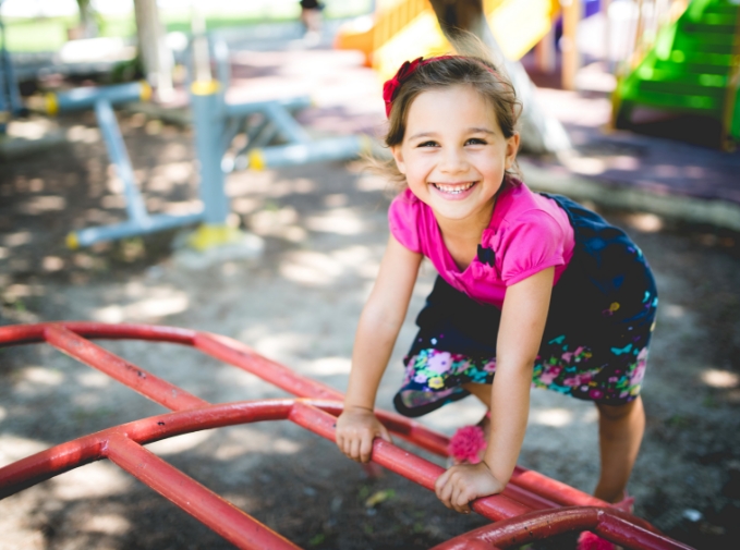 Child with healthy smile after laser frenectomy