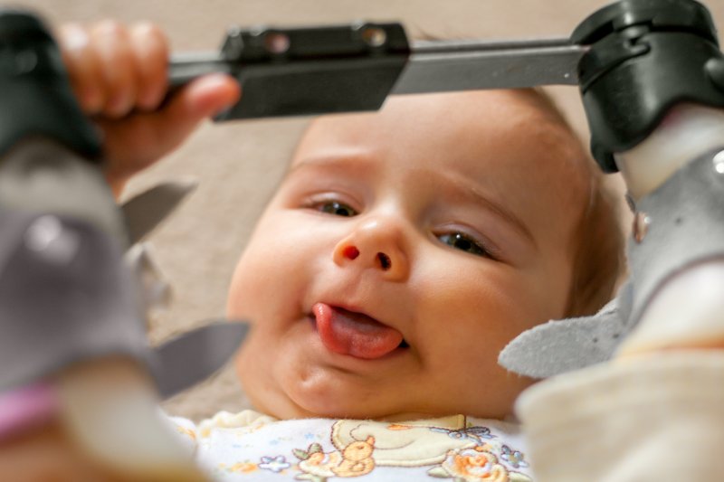 happy baby with tongue tie