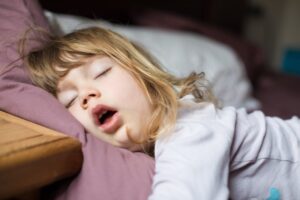 Young girl enjoying deep undisturbed sleep